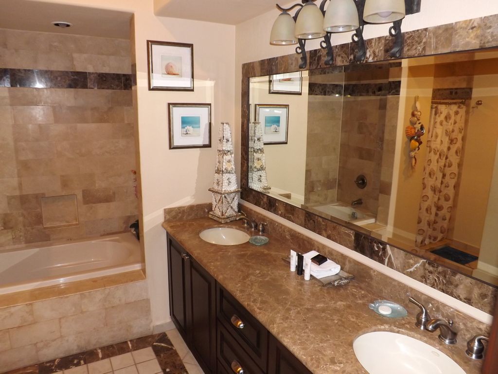 This gigantic bathroom vanity features dual vanities