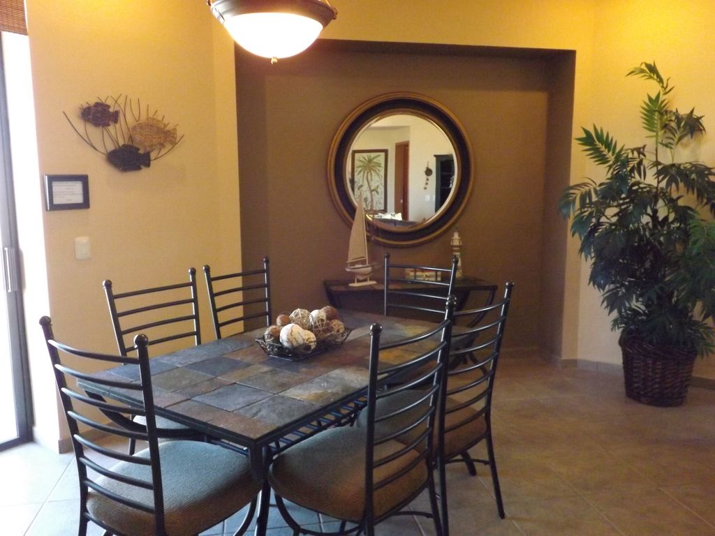 This large 6 person dining area is perfect for relaxing after spending the day at the beach