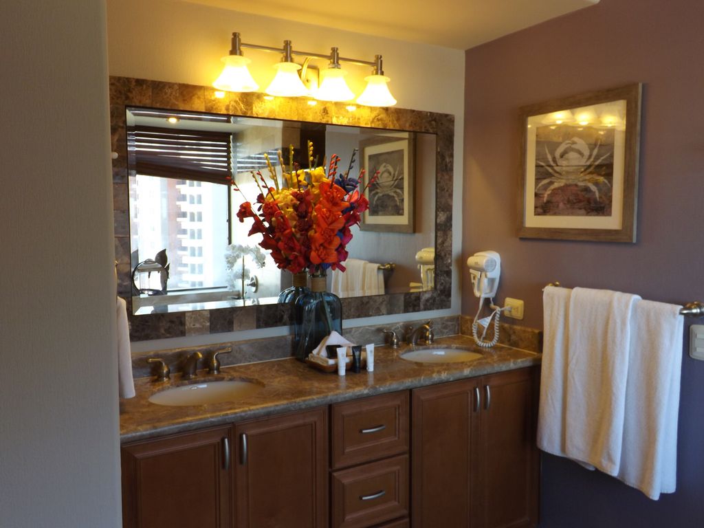 Beautiful two vanity bathroom with built in hair dyer