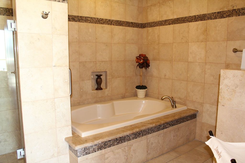 Beautiful tiled bathroom soaker tub